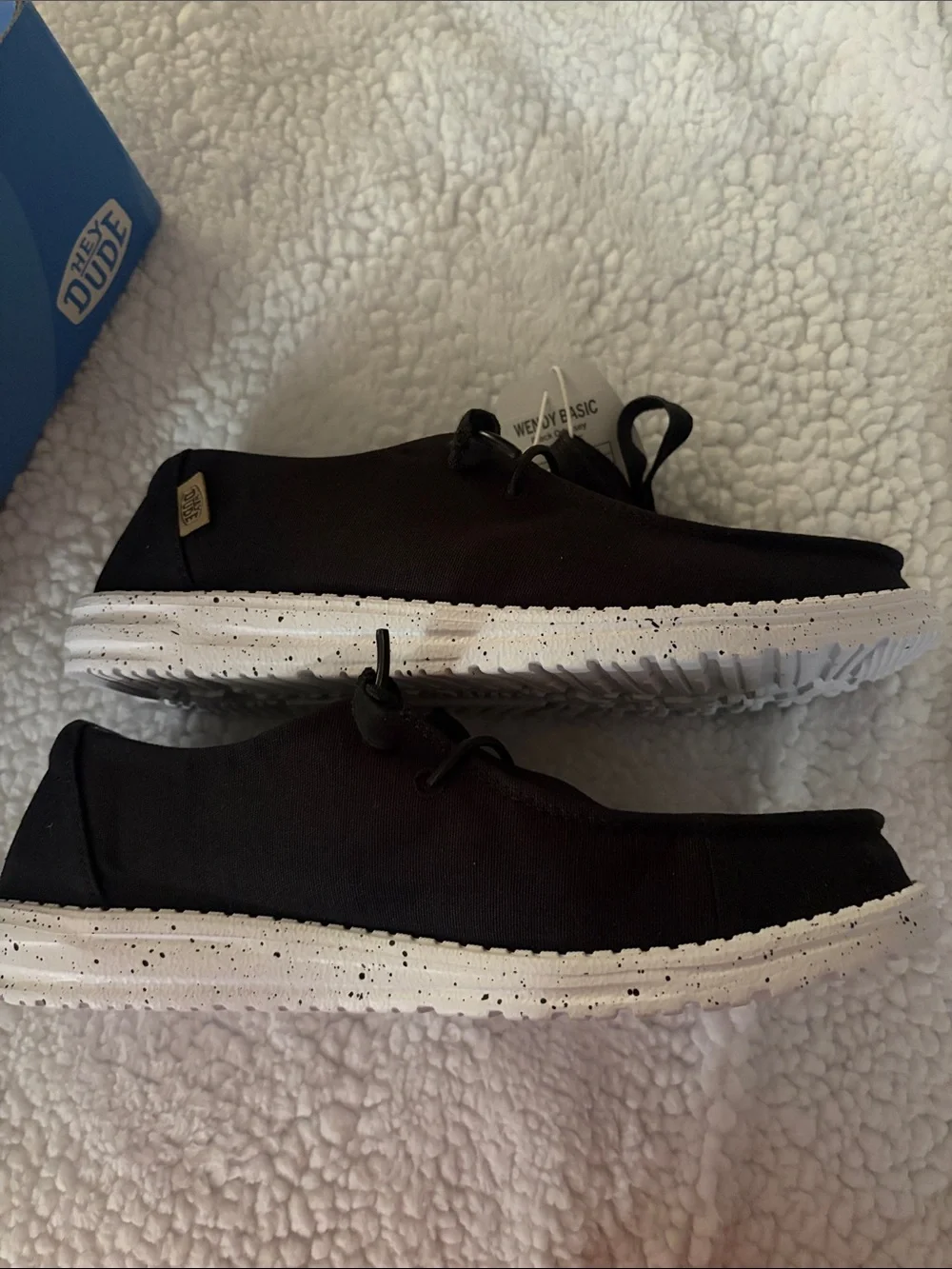 Hey Dude women’s Black Slip-On Canvas Sneakers with Patterned Lining